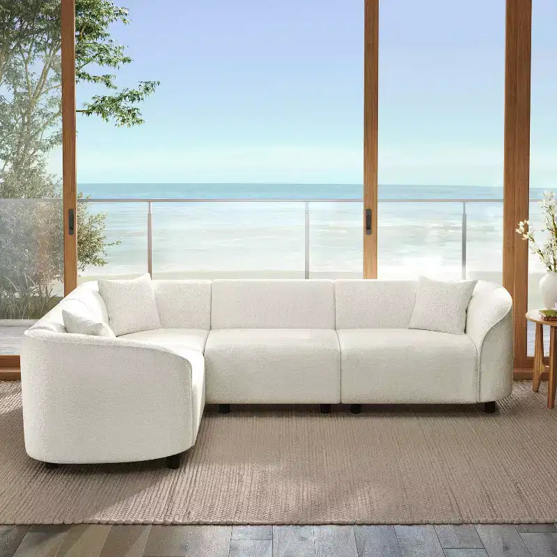 Divano componibile curvo a 4 posti a forma di L in bouclé Isolde Contemporary 104" Beige